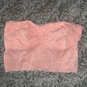 Baby pink lace tube top with an open laced back